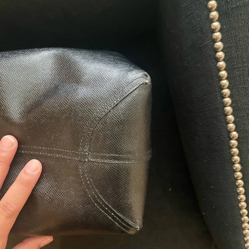 Coach reversible city tote in great overall condition has some wear at handles.
